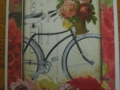 Bicycle and flowers in basket