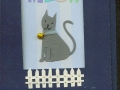 gray cat with fence, window card