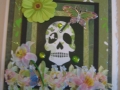 Green skull with lilies