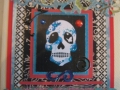 Skull with crown, blues and red