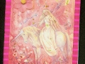 decorated_striped_book_with_unicorn