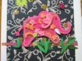 Pink elephant on gold-black