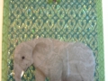 elephant on green glitter with red star