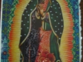 Blue and orange Our Lady with green background